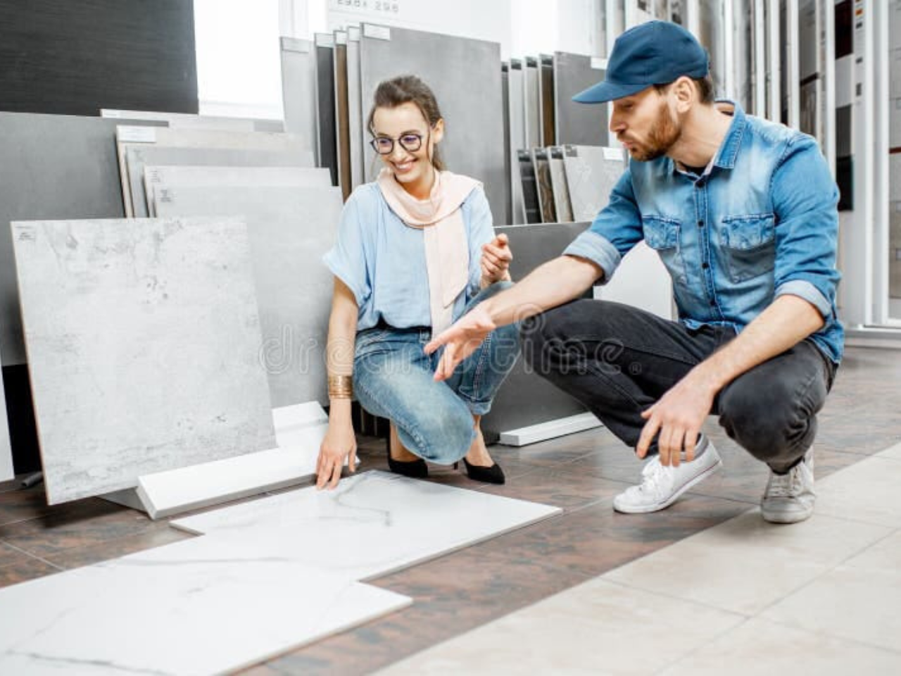 customer selection marble flooring titles in natural stone showroom in calicut